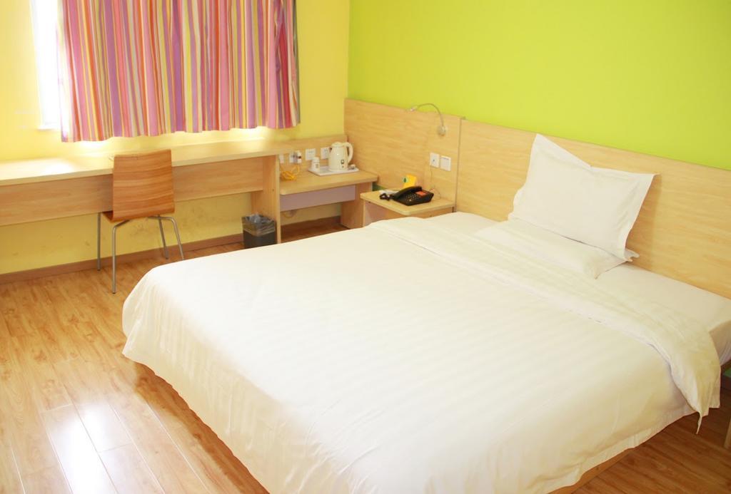7Days Inn Bazhong Jiangbei Bus Station Centre Экстерьер фото