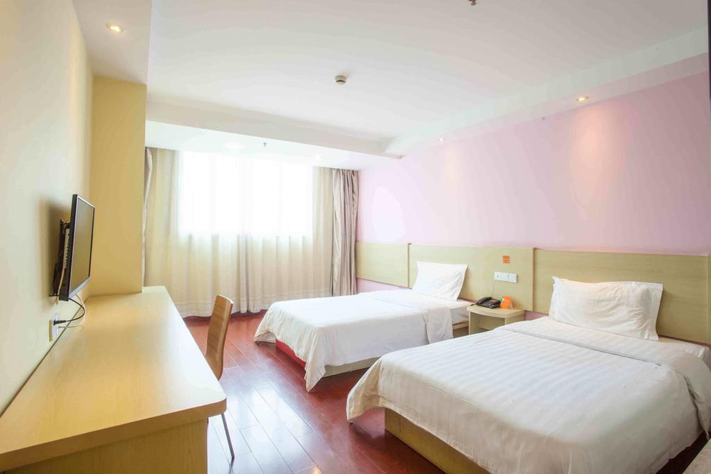 7Days Inn Bazhong Jiangbei Bus Station Centre Номер фото